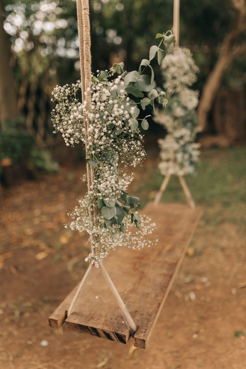 Decorated wooden swing for a traditional baby shower