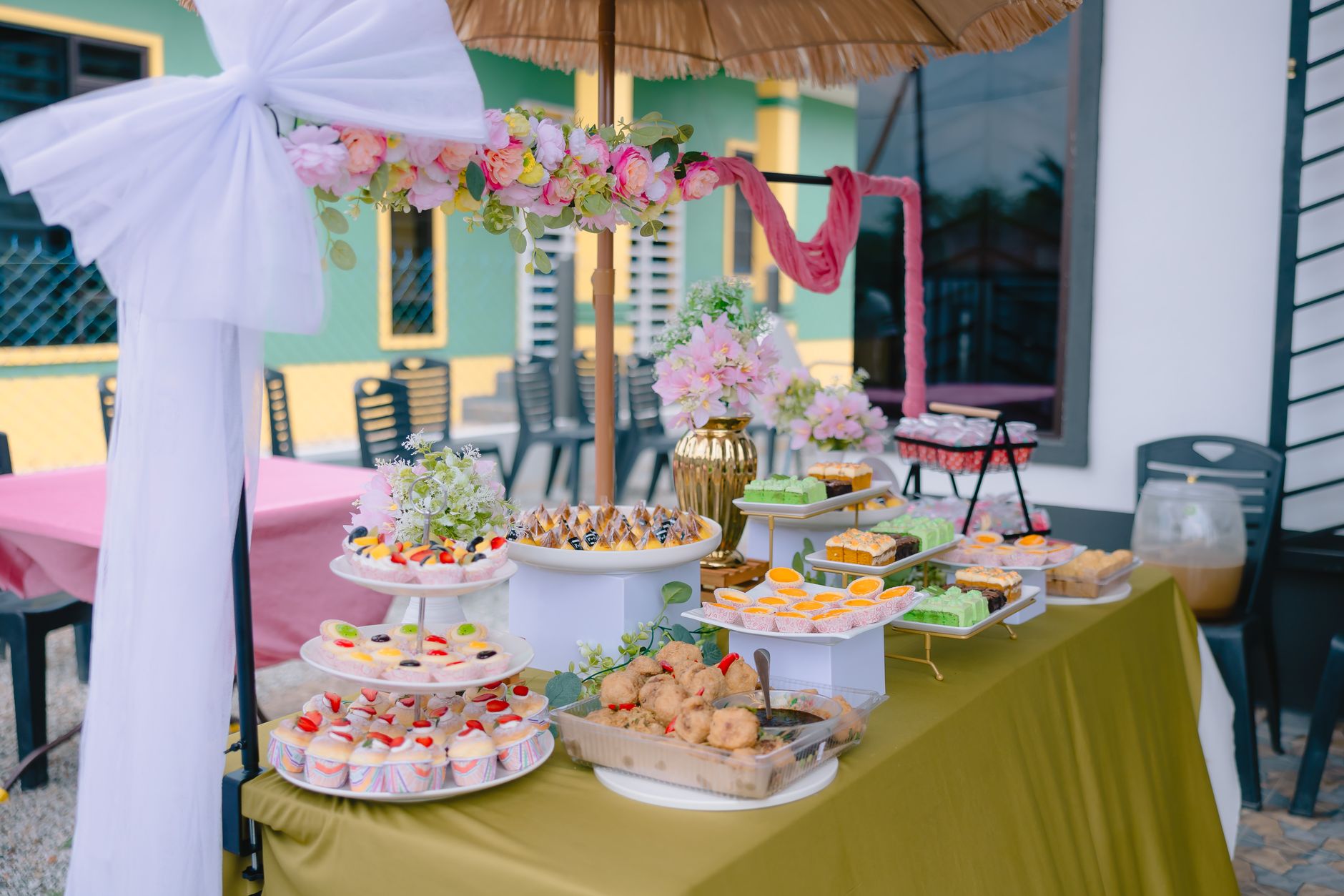 Decorated birthday cake and dessert table