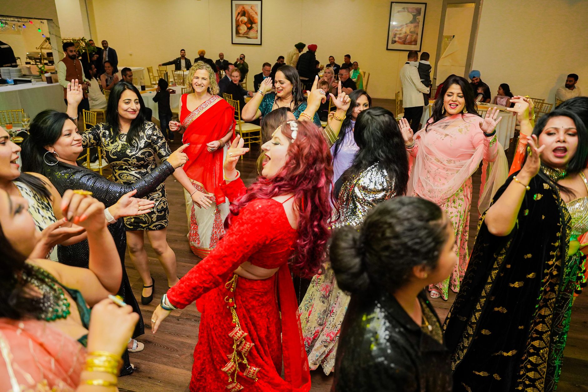 Warm celebration atmosphere representing The Grand Aura Events